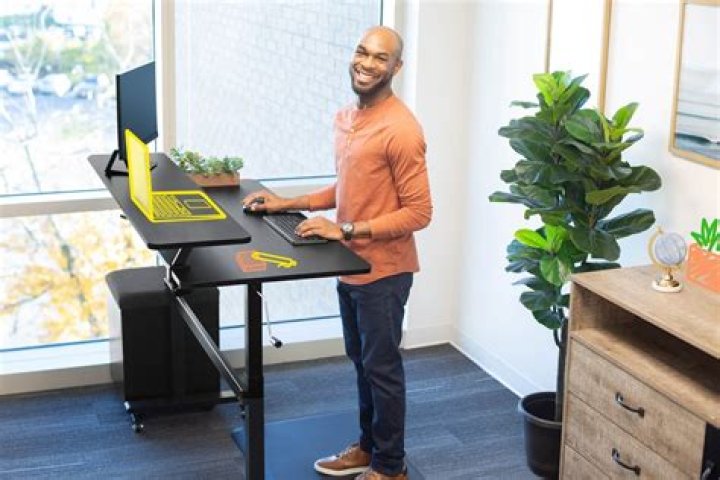 Do architects sit at a desk all day?