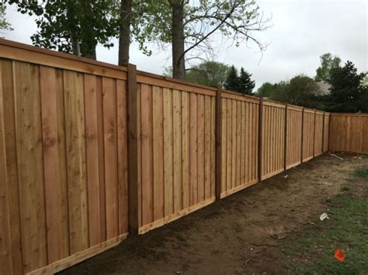 How tall can a wood fence be?