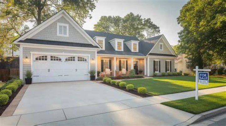 What adds more value to a house a garage or extra room?